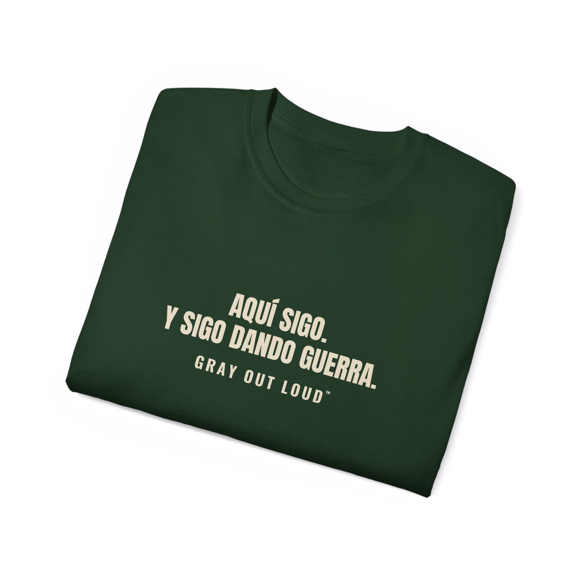 Aquí Sigo. Y Sigo Dando Guerra Tee — Gray Out Loud (Spanish)